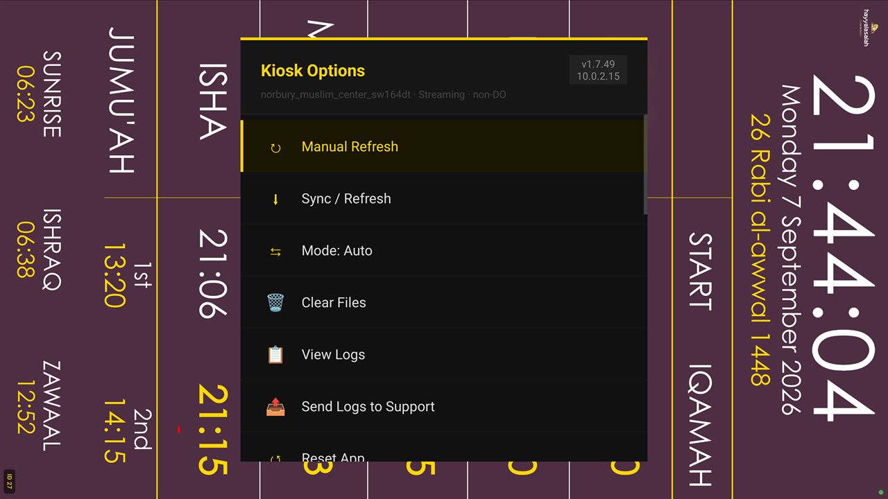 The Kiosk Options menu open over a prayer screen, showing the app version and mode in its header